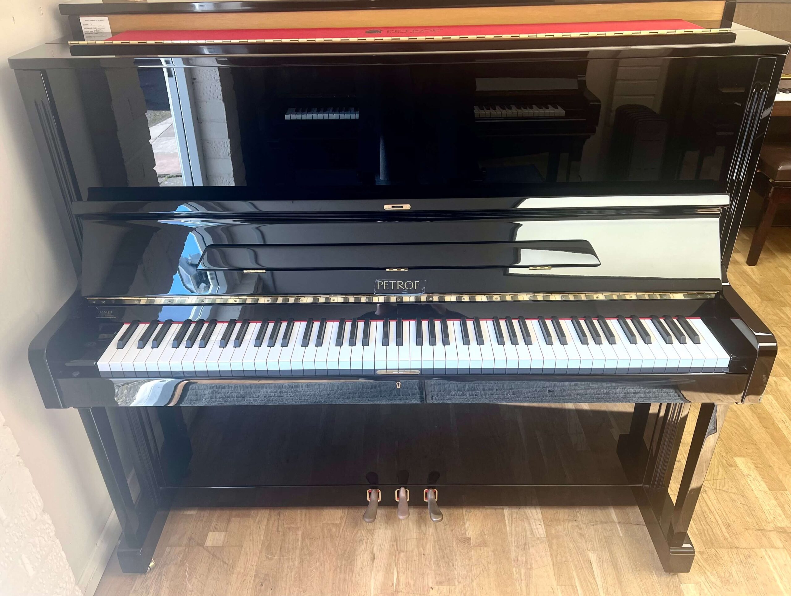 Petrof P125 G1 Upright Piano in mirror black case with high gloss finish