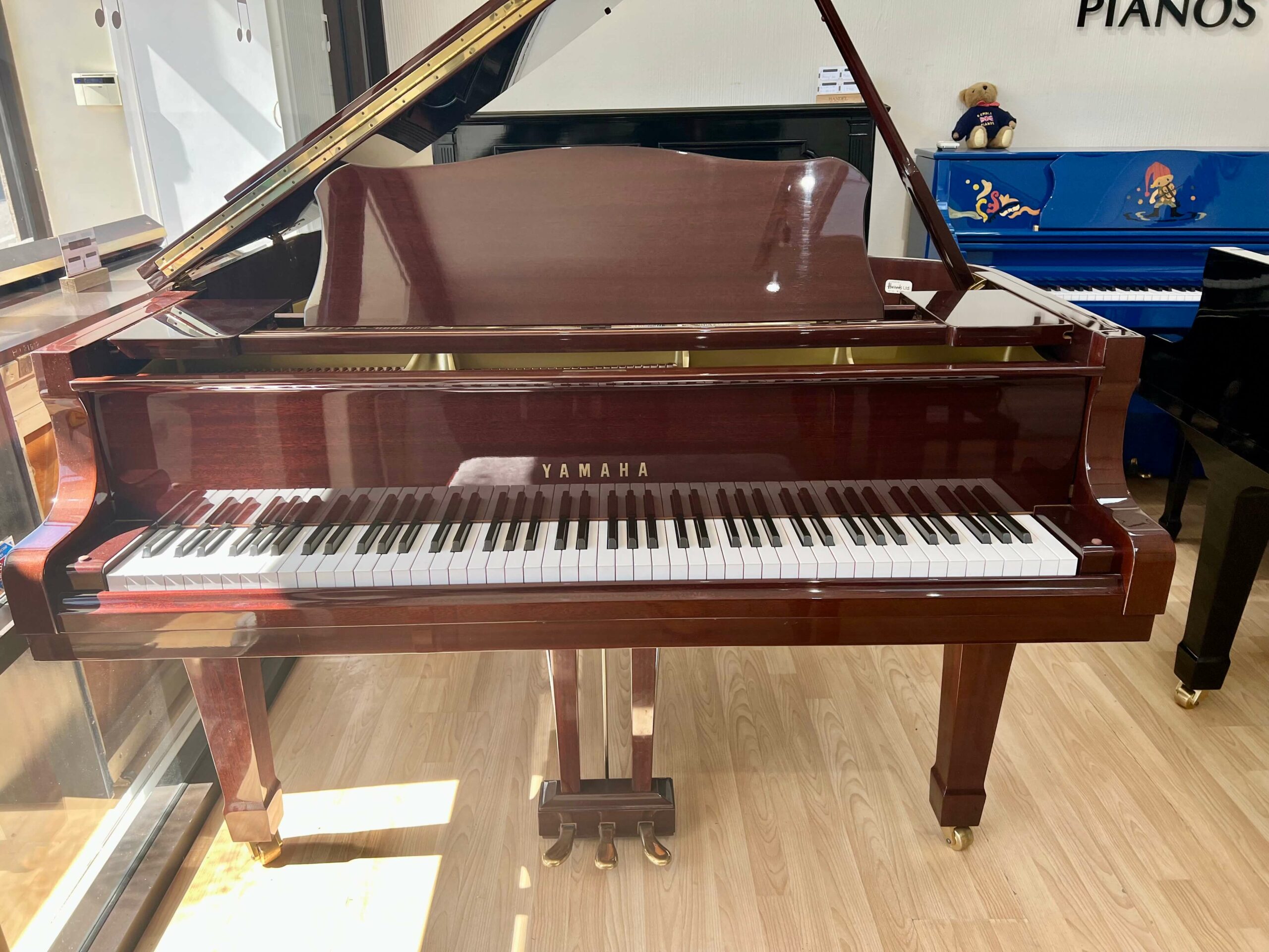 Yamaha G1 Baby Grand Piano (Self Play) in darker wood, mahogany case with gloss finish