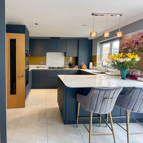 Modern kitchen with Line N cabinets, American-style fridge freezer and integrated storage
