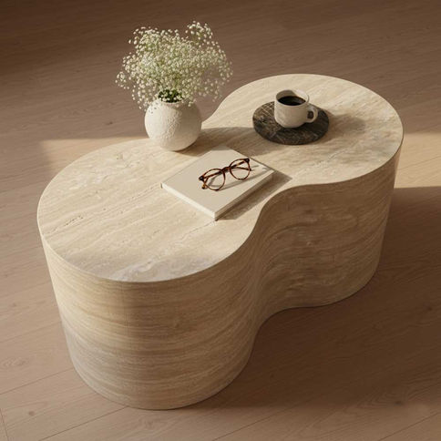 This coffee table is crafted from natural travertine stone