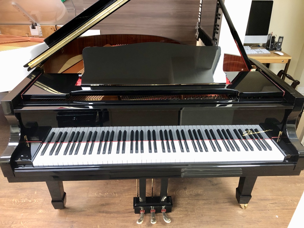Danemann DG-158 Baby Grand Piano in a polished black case