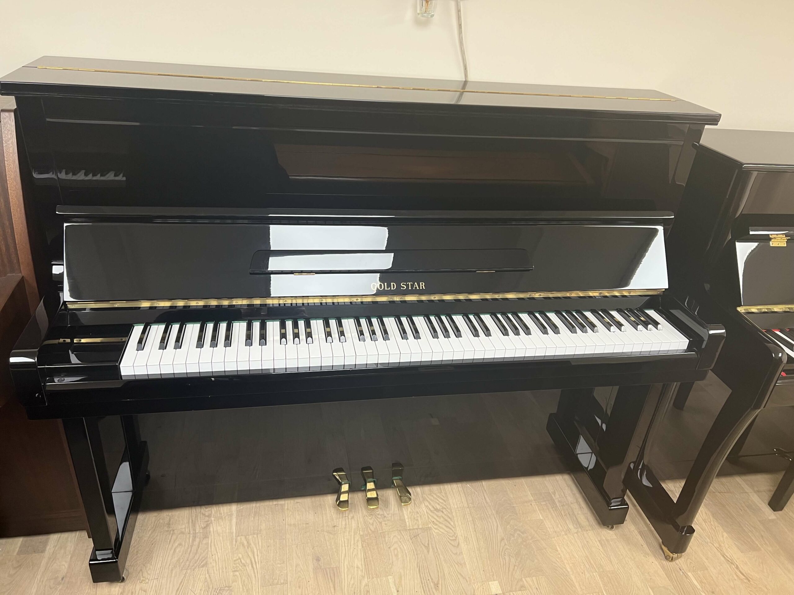 Gold Star Upright Piano