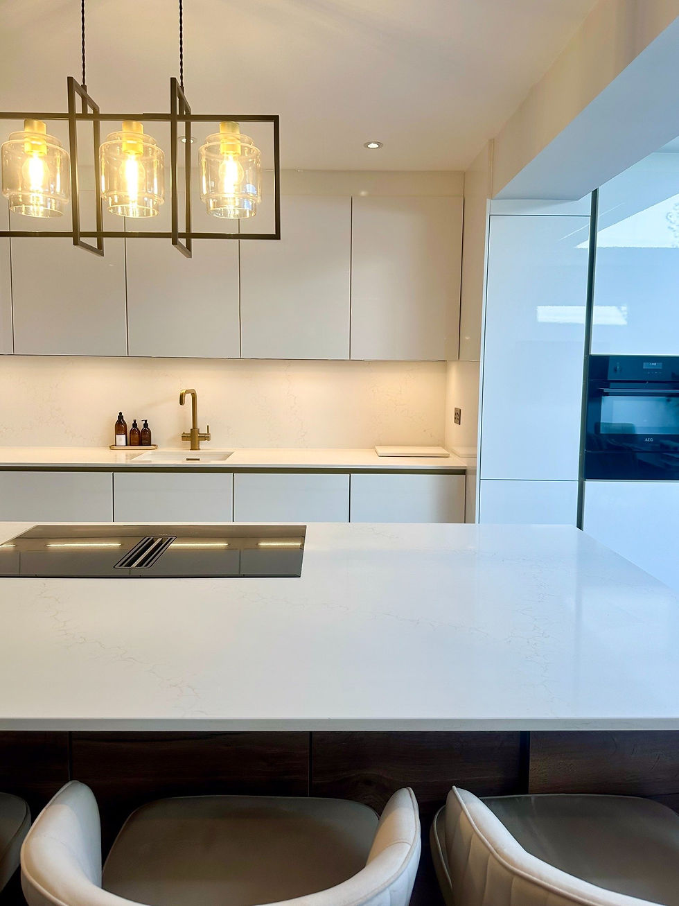 Minimalist kitchen island with pendant lighting