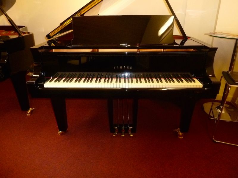 Yamaha CF4 Grand Piano in a polished black case