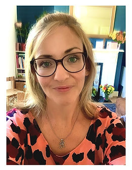 Blonde Lady with glasses workin g from home