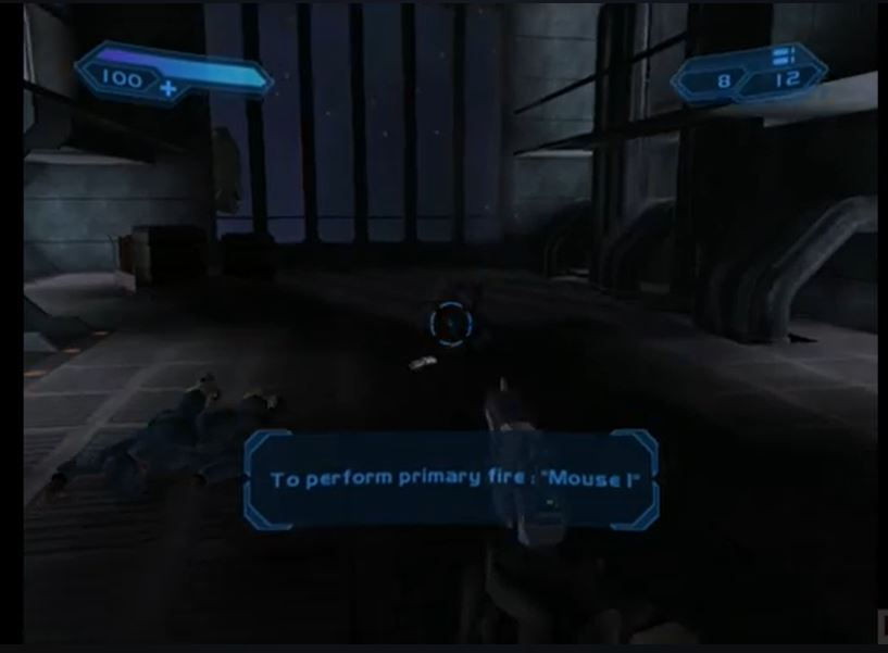 Miniatura: Screenshot di gioco: sparatutto in prima persona, ambiente buio, testo "To perform primary fire "Musa F"