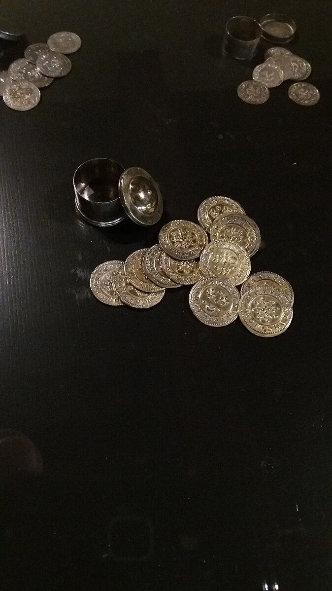 14世紀の13枚のコイン、トライザイン