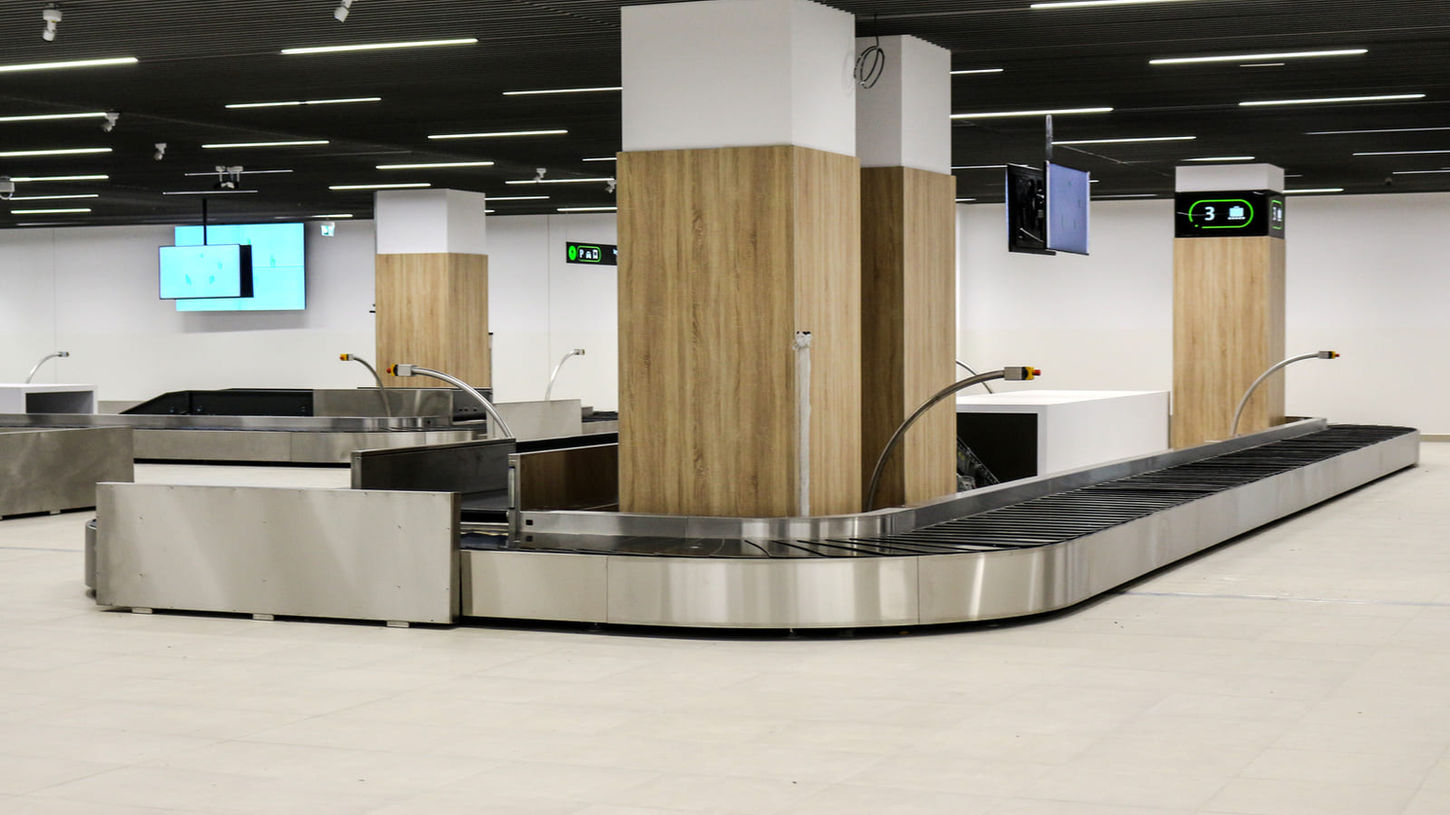 international baggage reclaim carousel in airport arrivals area