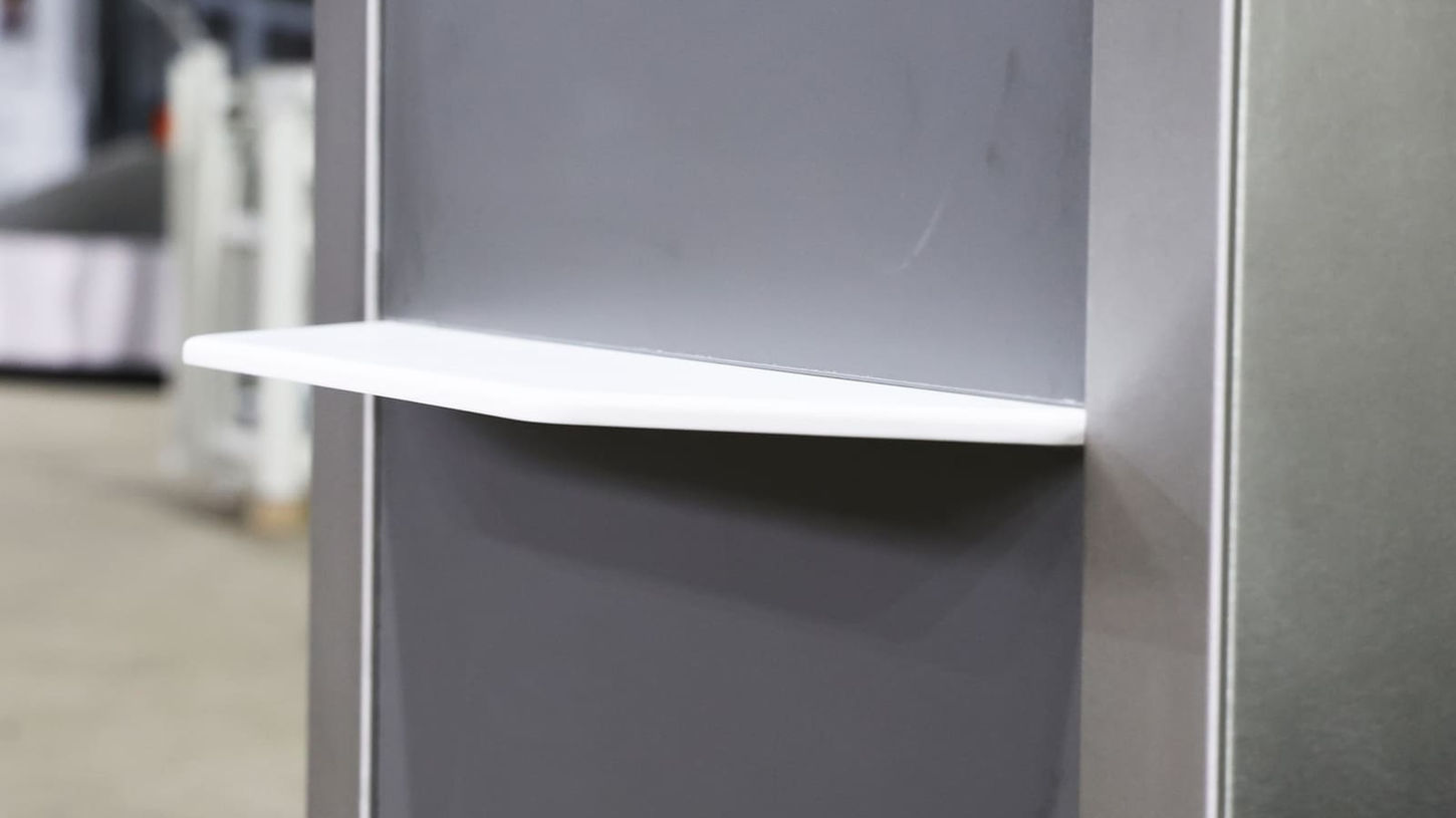 table detail on airport check-in desk with weigh-in platform