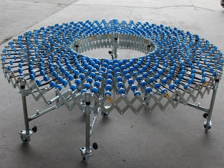 Conveior gravitational - Extensibil - Cu discuri - Pat de role gravitational