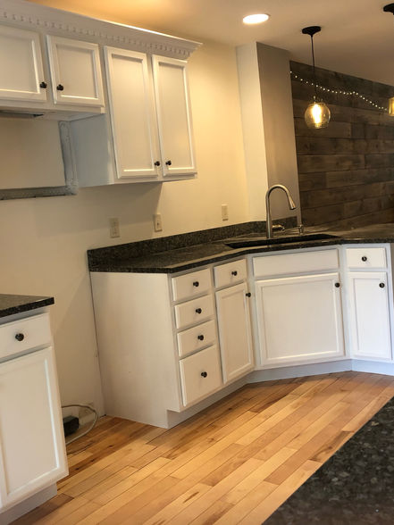 Classic White Cabinet Elegance - Explore the timeless beauty of classic white cabinets, showcasing how a clean and sophisticated color choice can brighten and modernize any kitchen space.