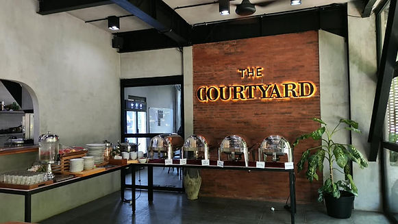 In-house catering buffet set up in The Courtyard at FLOW Workspace Sanur, Bali
