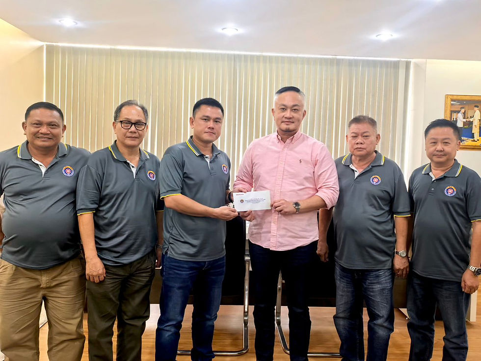 Datuk Najib Tay Abdullah receives his letter of appointment as Honorary President of TCA from TCA President, Henery Wong Chen Khiong.