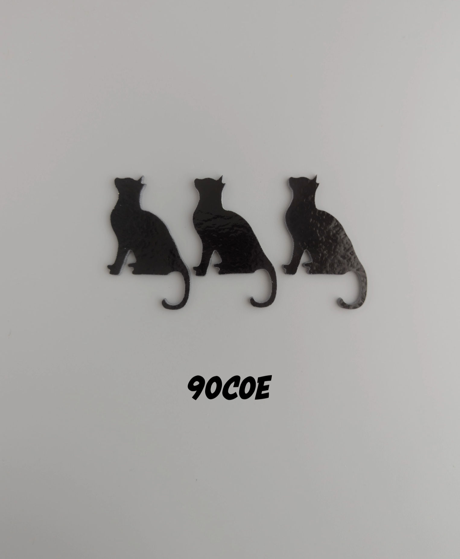 Picture of glass cat 3 pack with a curled tail 