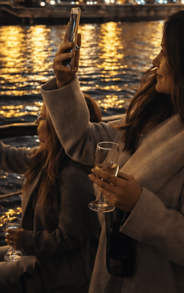 2 photo taking girls social budapest danube cruise.png
