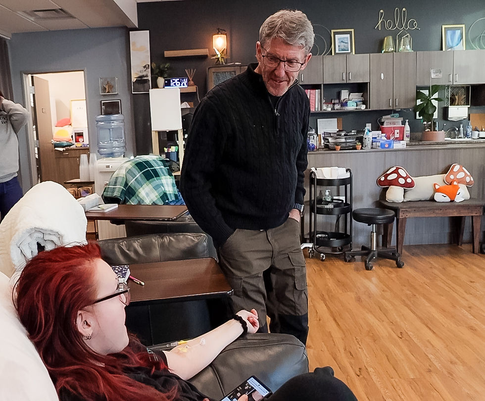 northern-neurology-dr-ryan-visiting-infusion-patient.jpg