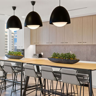 Modern office space at Prudential Center in Boston with open kitchenette, individual offices, and great conference rooms. The contemporary design emphasizes common areas and gathering spaces for collaboration and productivity. Plenty of natural light and breathtaking views make it perfect for finding inspiration.