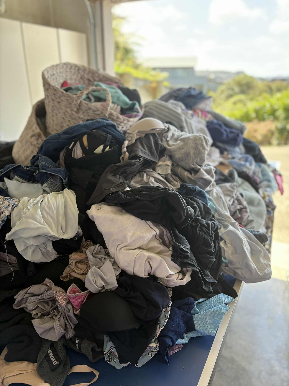 A high pile of family washing waiting to be done - "Mount Washmore"...