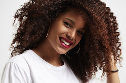 Beauty Smiling Black Woman With Amazing Afro Curly Hair