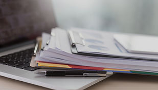 Laptop and Paperwork_edited.jpg