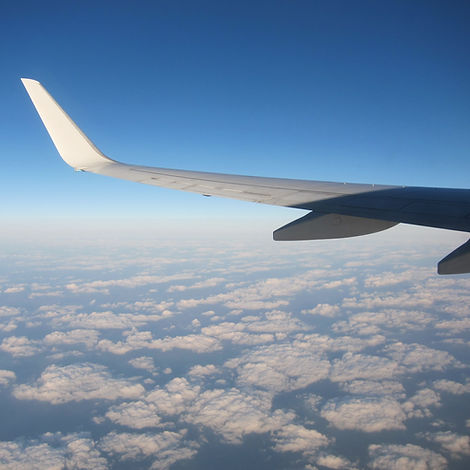 Aeroplane wing above the clouds