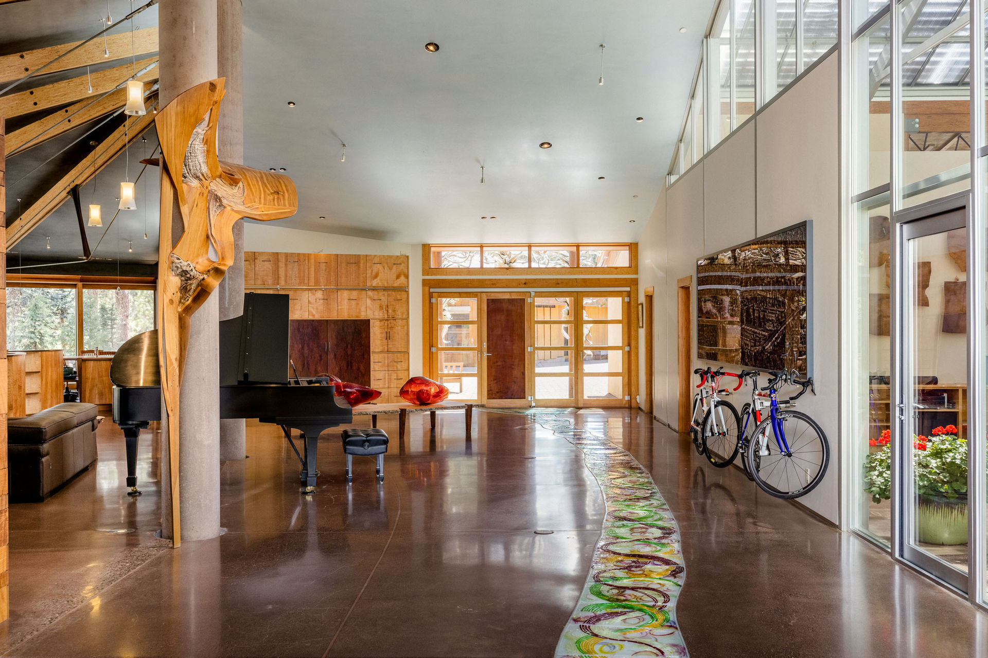 Wide open space and contrasting texture invite you into a master crafted home. Inset mosaic tile. Photographed by Zachary Bascom