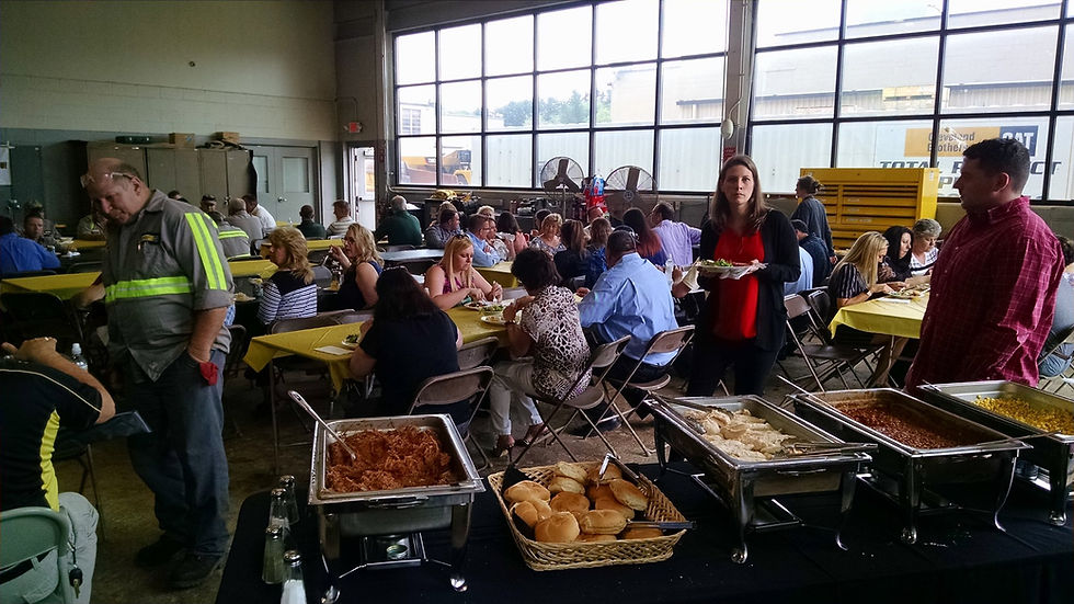 A festive buffet setup for an employee appreciation event, complete with engaging, interactive food stations.