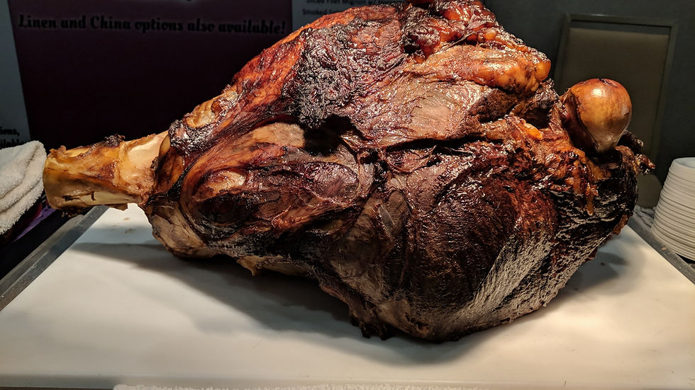 An elegant boardroom dining setup featuring meticulously plated meals and sophisticated table settings, perfect for VIP events.