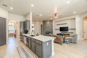 Open kitchen remodel with gray island, Dallas TX home renovation