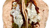 Carne Asada Fajitas with Shishito Peppers and Cilantro Lime Sour Cream