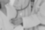 elderly-female-smiling-with-doctor-visiting-senior-patient-woman-hospital-ward_edited.jpg