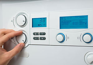 adjusting-settings-on-a-boiler-display.jpg