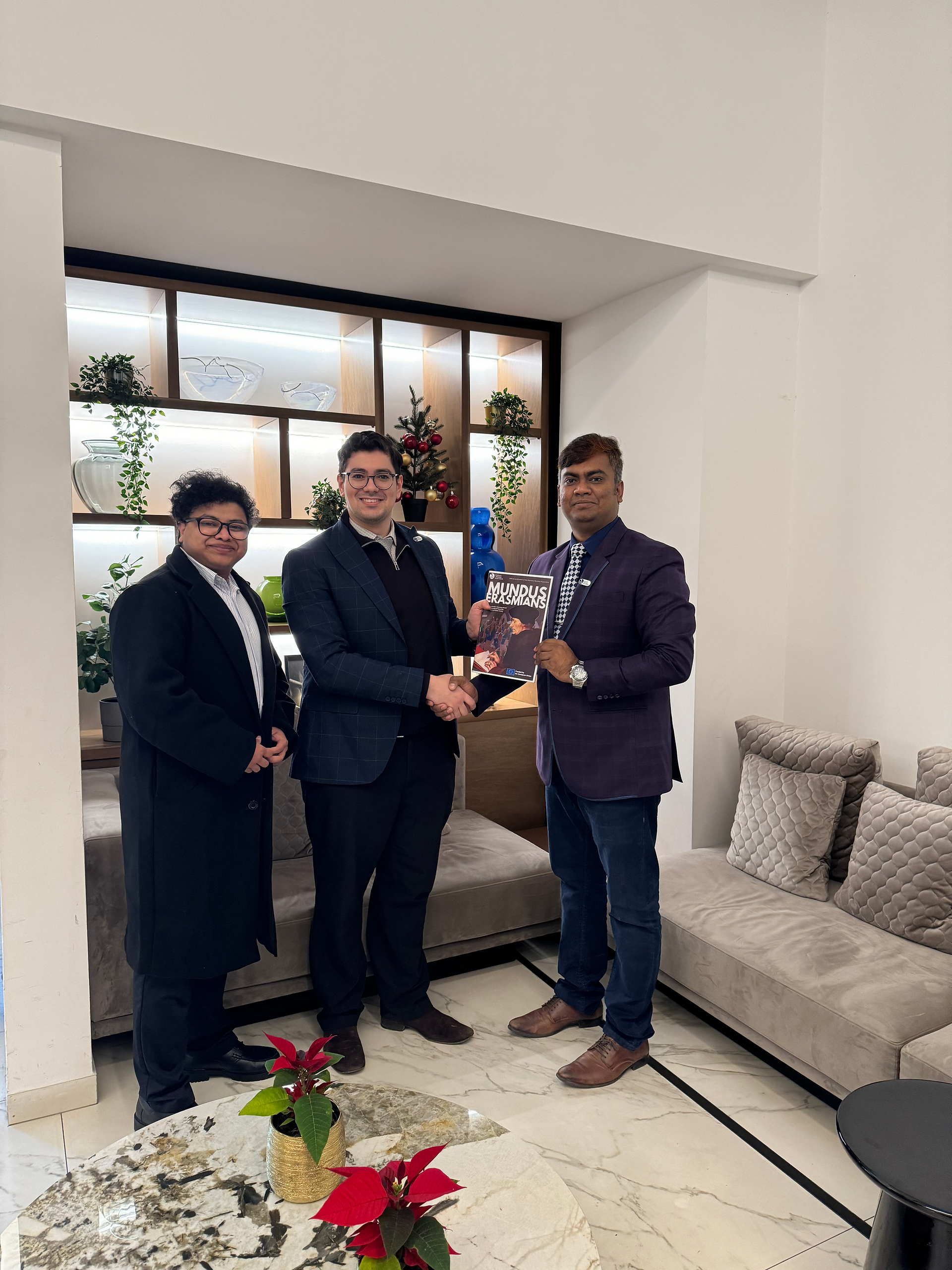 Razy (Editor-in-Chief) presented the inaugural magazine to Dr. Ashiqur, EMA President