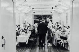Guests sat at communal tables to eat their dinner and mingle