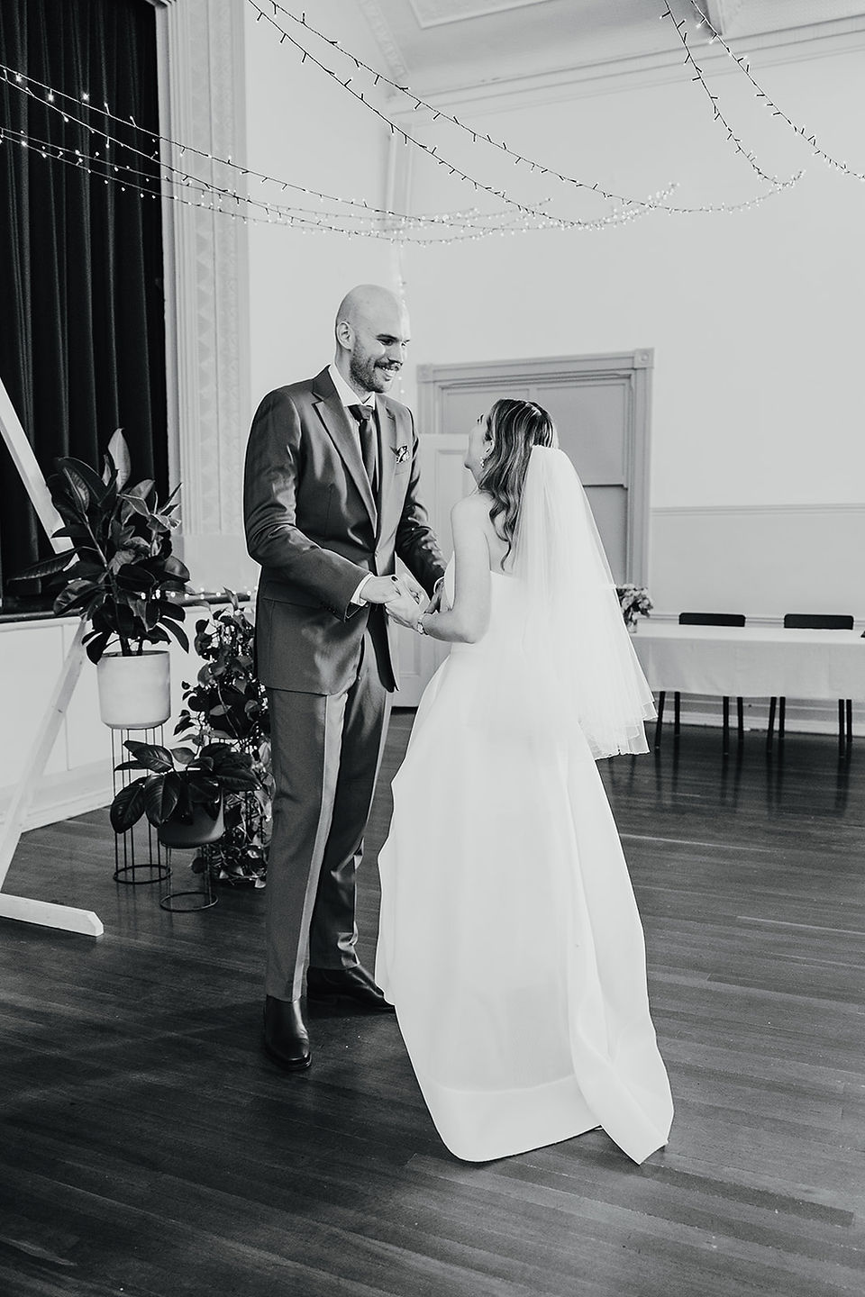 The bride and groom having a first look at North Perth Town Hall