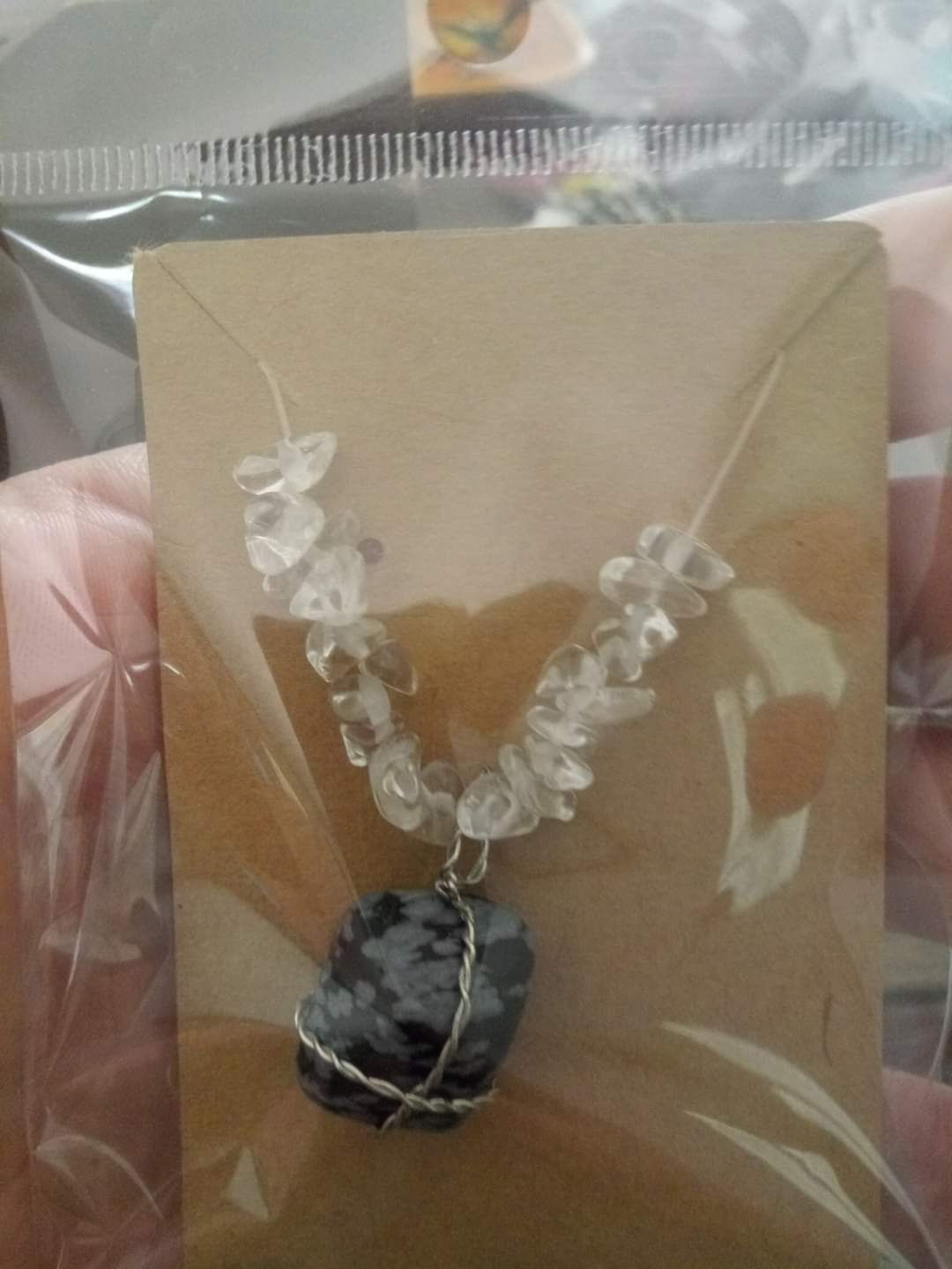 Snowflake obsidian wire wrapped crystal with clear quartz 