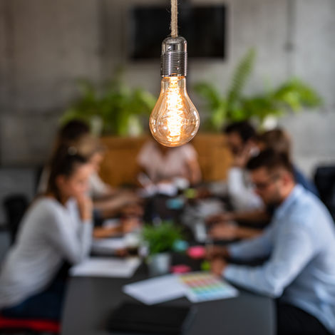 Team Meeting and Light Bulb