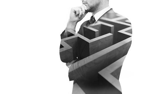 Young businessperson thinking about ways