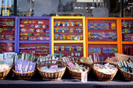 Colorful handmade earrings on display