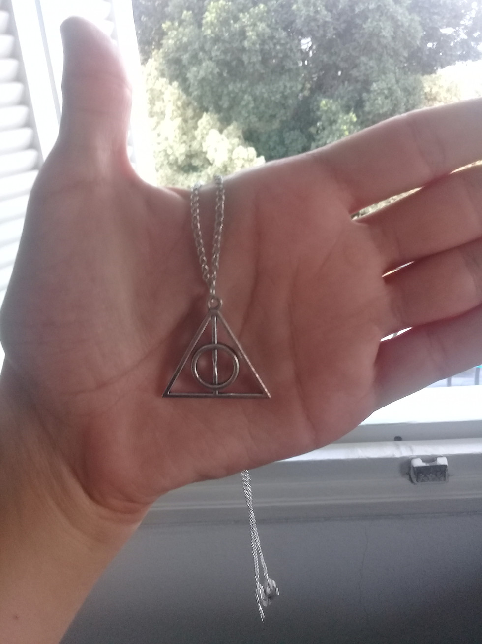 Thumbnail: Deathly Hallow Silver/Copper Necklace