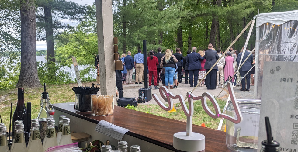 behind the bar during the wedding ceremony