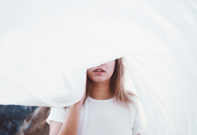 Girl Behind a Sheet