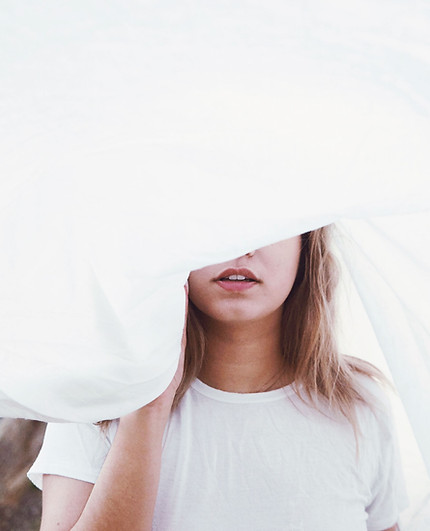 Girl Behind a Sheet