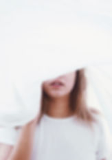 Girl Behind a Sheet
