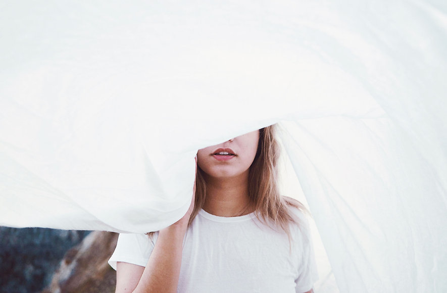 Girl Behind a Sheet