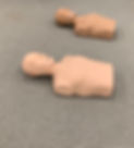 Adult CPR training dummies on the floor .jpg