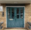 Old green double dront doors
