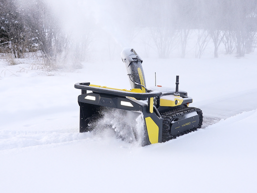 A Yarbo autonomous robotic snow blower in action in snow