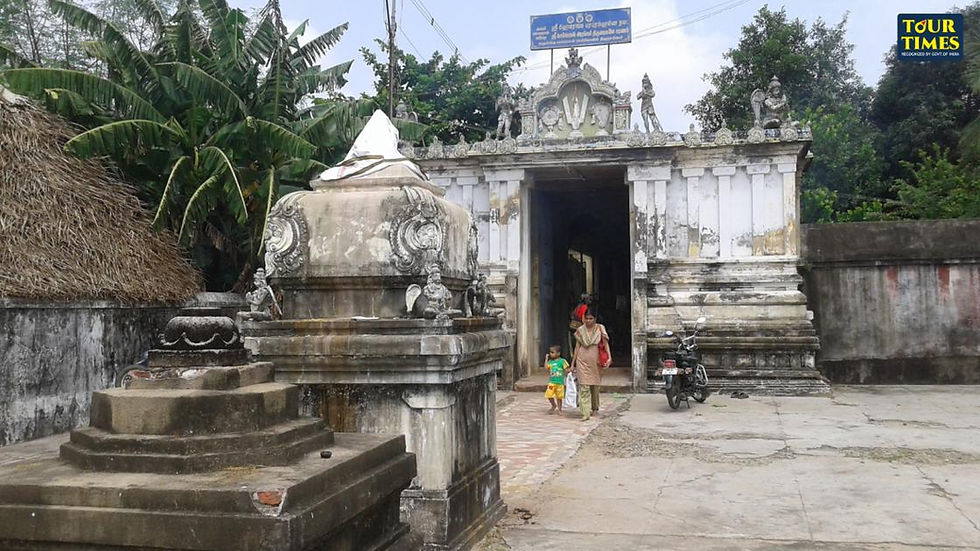 A woman and child walk near an ancient, intricately carved temple entrance. Lush green trees and a bike are visible. Sign reads "Tour Times. Thiru Sempon Sei Temple