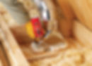 Air Sealing drafts in the attic under attic insulation by Colorado Home Services